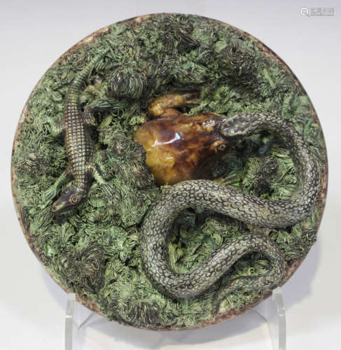 A Mafra majolica Portuguese Palissy Ware dish, late 19th century, applied with a snake, toad and
