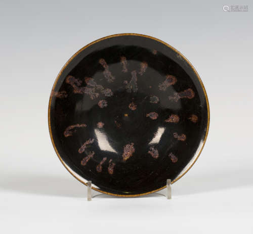 A Charles Vyse stoneware studio pottery bowl of flared circular shape, covered in a tenmoku glaze,