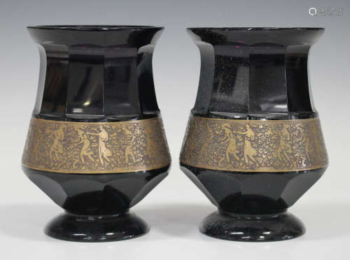 A pair of Art Deco Moser amethyst tinted glass vases, 1920s, each gilded with an Oroplastic band
