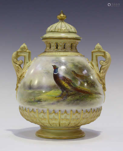 A Royal Worcester porcelain potpourri vase, liner and cover, circa 1910, the bulbous body painted by