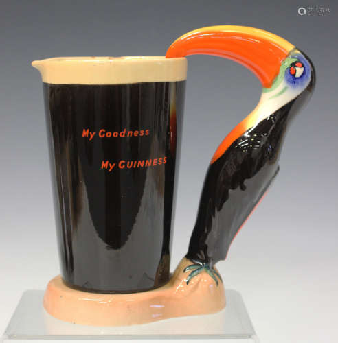 A Carlton Ware Guinness advertising jug with toucan handle, red printed factory marks to base,