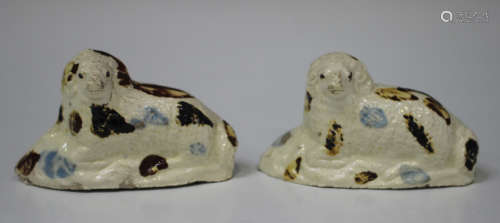 Two creamware pottery rams, late 18th/early 19th century, possibly Yorkshire, modelled recumbent