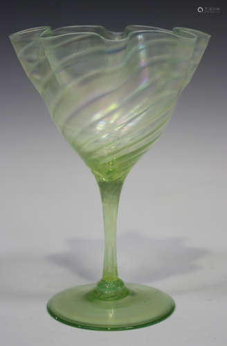 An iridescent lime green glass footed vase, possibly by John Walsh Walsh, early 20th century, the