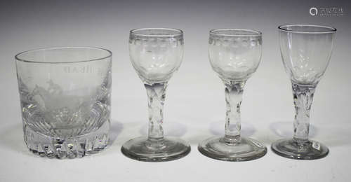 A pair of faceted stem glasses, late 18th century, each rounded bowl cut with a band of oval