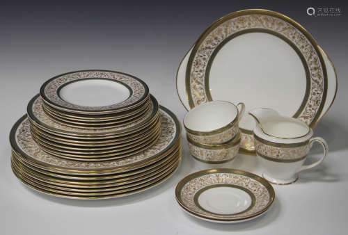 A Minton Aragon pattern bone china part service, comprising eight dinner and dessert plates, cake