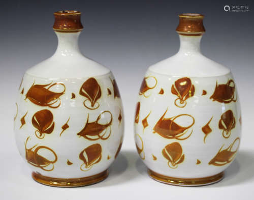 A pair of Edgar Campden Aldermaston pottery table lamps with ochre lustre decoration, painted
