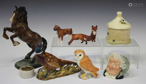 Six Beswick animals, comprising Pheasant, No. 1226, Rearing Welsh Cob, No. 1014, Barn Owl, No. 2026,