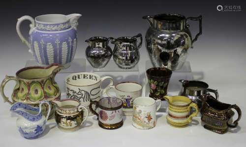 A small group of Staffordshire pottery jugs, mugs and beakers, 19th century, including a lilac