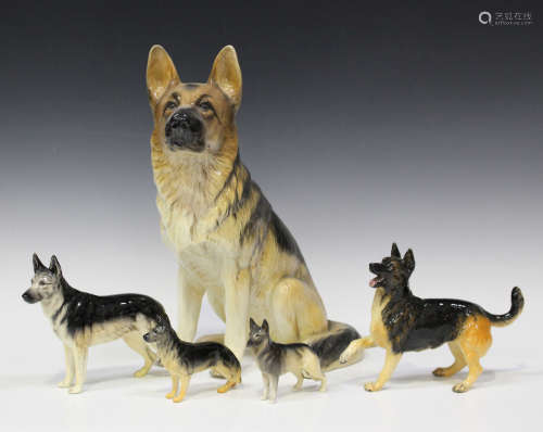 Five Beswick models of Alsatians, Nos. 969, 1762A, 1762B, 2410 and 3073, together with a group of