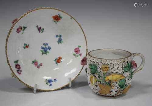 A Meissen porcelain schneeballen cup and saucer, late 19th century, the cup exterior and saucer