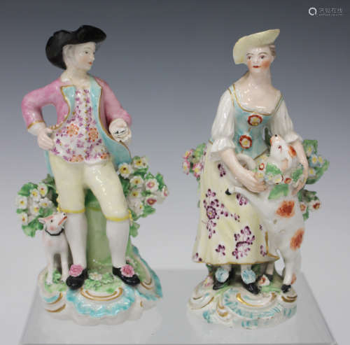 A pair of Derby porcelain figures, late 18th century, modelled as a girl with a lamb and a boy