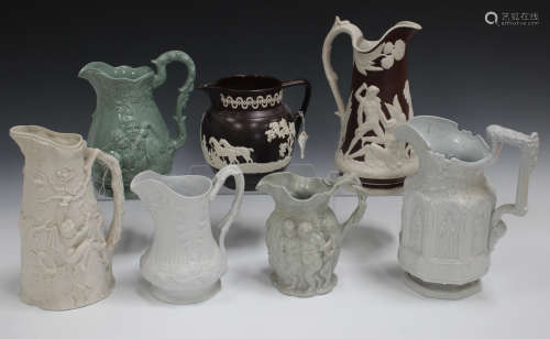 A Wilson brown washed white feldspathic stoneware jug, circa 1810-20, sprigged with huntsmen, horses