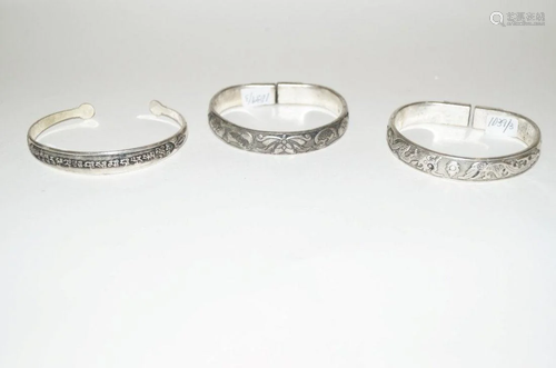 Three Chinese silver carving bangles