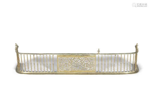 A WILLIAM IV BRASS RAIL FENDER, of bowed from with pierced frieze panel and rope twist border. 136cm
