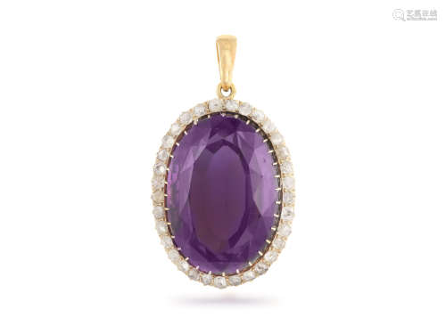 A DIAMOND AND AMETHYST PENDANT, the oval mixed-cut amethyst to a rose-cut diamond surround,