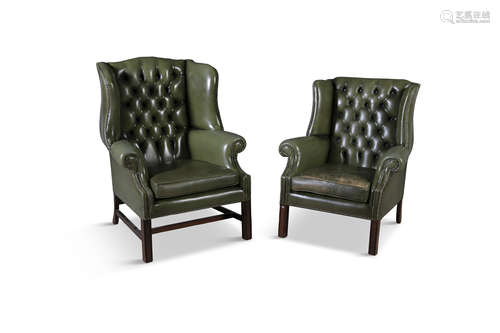 TWO MAHOGANY FRAMED LEATHER UPHOLSTERED LIBRARY ARMCHAIRS, each with button back seats and close