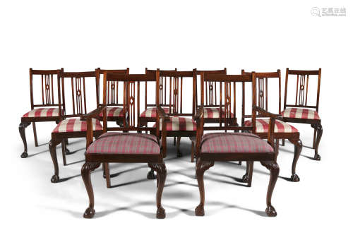 A SET OF TEN MAHOGANY FRAMED DINING CHAIRS, in the Georgian style, the rectangular backs with