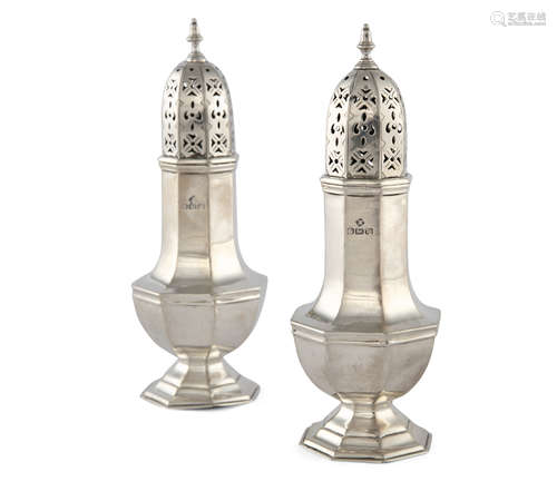 A PAIR OF EDWARDIAN SILVER FACETED BALUSTER SHAPED SUGAR CASTERS, Sheffield 1904, mark of Martin