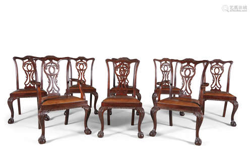 A SET OF EIGHT MAHOGANY FRAMED DINING CHAIRS, c.1920, in the Georgian style, comprising two