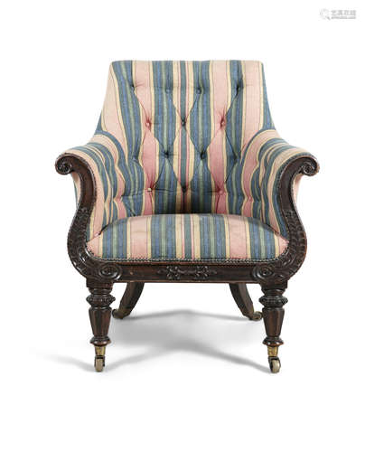 A WILLIAM IV ROSEWOOD FRAMED LIBRARY ARMCHAIR, upholstered in striped polychrome patterned fabric,