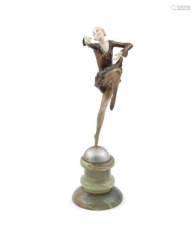 LORENZL (20TH CENTURY) A Figure of an Art Deco Dancer, Bronzed with ivory on onyx base, 30cm high in