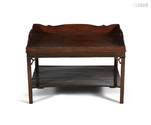 A 19TH CENTURY MAHOGANY RECTANGULAR BUTLER'S TRAY TOP OCCASIONAL TABLE, with raised panel sides,