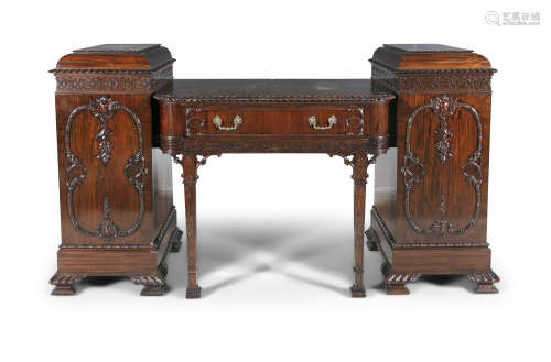 AN EDWARDIAN MAHOGANY TWIN PEDESTAL SIDEBOARD, in 'Chinese Chippendale' taste, the breakfront top