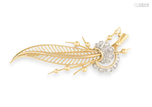 A DIAMOND SPRAY BROOCH, CIRCA 1950, of foliate design, the stylised elongated leaf with beading