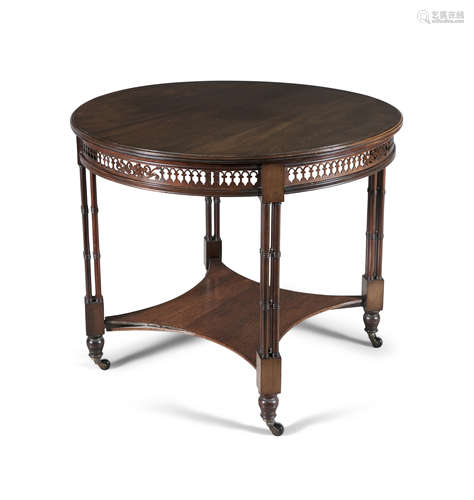 A 19TH CENTURY CIRCULAR CENTRE TABLE, the top with moulded rim, above pierced trelliswork frieze,