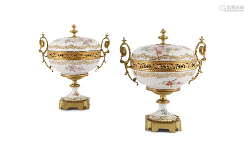 A PAIR OF SÈVRES STYLE PORCELAIN AND ORMOLU MOUNTED CASSOLETTES, the covers with pineapple