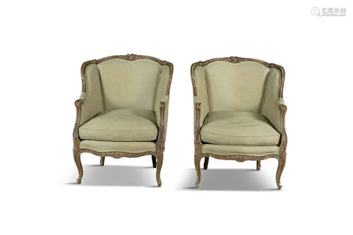 A PAIR OF LOUIS QUINZE STYLE PAINTED AND PARTIALLY GILDED BEECHWOOD FRAMED FAUTEUILS, the shaped