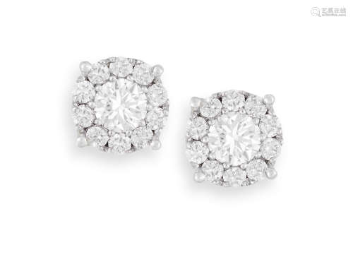 A PAIR OF DIAMOND EARSTUDS, each set with brilliant-cut diamonds at the centre, within a pavé-set