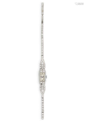 AN ART DECO DIAMOND-SET COCKTAIL WATCH, the rectangular-shaped dial with Arabic numerals, set with