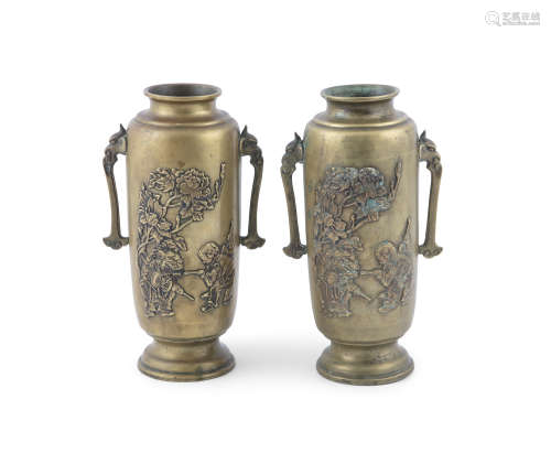 A PAIR OF JAPANESE BRONZE 'IKEBANA' VASES, 19th century, of cylindrical form, with stylised mask