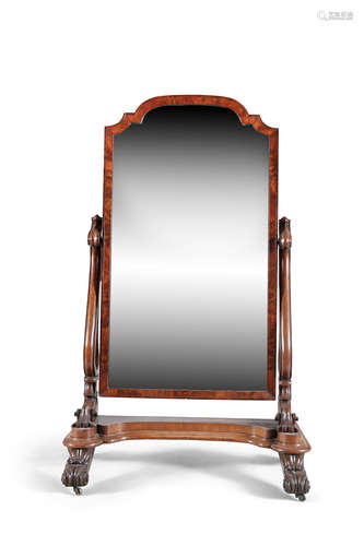 A VICTORIAN MAHOGANY FRAMED CHEVAL MIRROR, the shaped rectangular mirror with domed top, supported