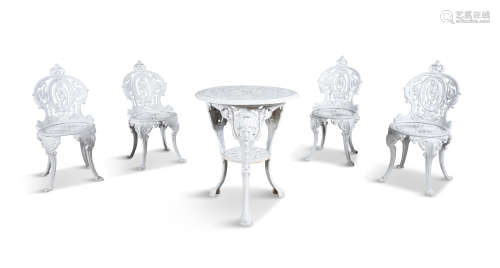 A WHITE PAINTED CAST IRON GARDEN TABLE AND FOUR CHAIRS, the table with pierced circular geometric