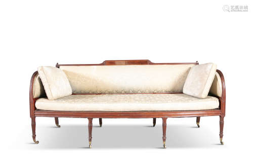 A GEORGE IV MAHOGANY FRAMED BERGERE SETTEE, with reeded frame, the back with central tablet