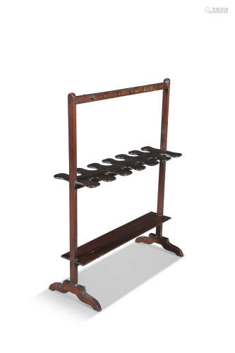 A VICTORIAN MAHOGANY BOOT RACK with 12 notch platform, 82cm wide, 107cm high