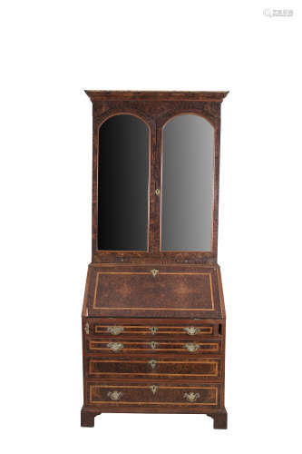 A GEORGE II STYLE INLAID WALNUT BUREAU BOOKCASE, the moulded cornice above twin mirror panel doors