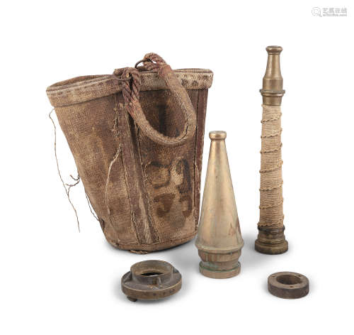 AN 18TH/19TH CENTURY CANVAS FIRE BUCKET, together with an assortment of brass hose nozzles and