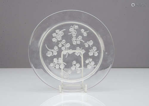 A Rene Lalique salad plate, Muguet pattern, the clear glass circular plate with moulded decoration