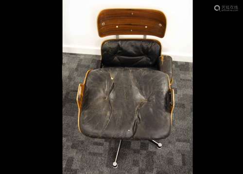 A Charles and Ray Eames 670 lounge chair and ottoman, made by Hille of London concessionaires for