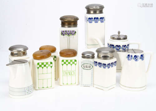 A set of three German Jugendstil ceramic kitchen storage jars, of square moulded design, with