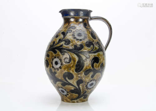 A large continental stoneware jug, of ovoid shape with sgraffito decoration of stylised flower heads