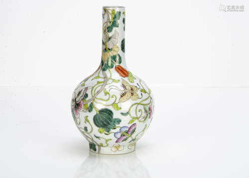 A Chinese famille verte Kangxi style bottle vase, the white ground with polychrome decoration of