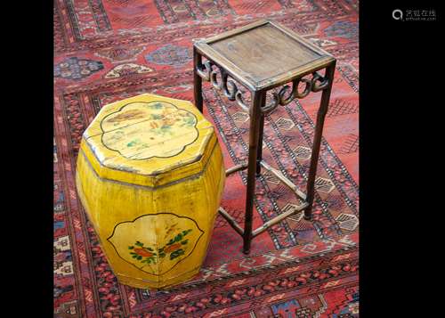 A hardwood occasional table with square top, pierced border on stylised bamboo supports, 25cm square