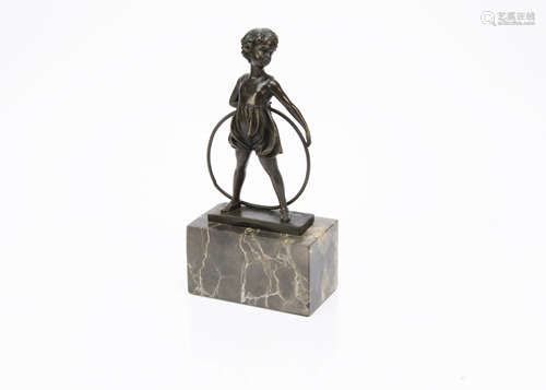 After Ferdinand Preis, a reproduction figure modelled as girl with hoop on rectangular hardstone