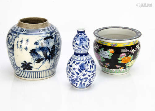 A large Chinese porcelain blue and white ginger jar, decorated with floral and exotic bird design,