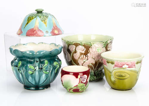 A collection of continental majolica jardinières, including a hanging basket, with stylised pink