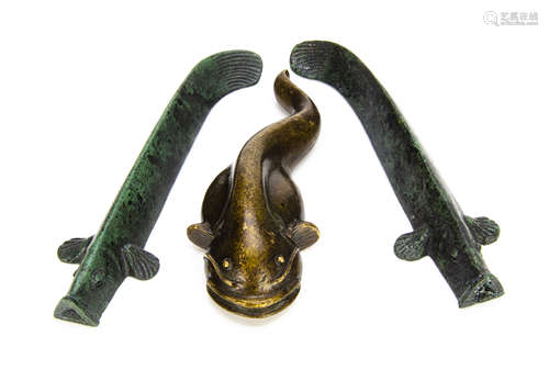 A miniature Chinese bronze model of a fish, with wide mouth, large belly with flat bottom, 11cm long